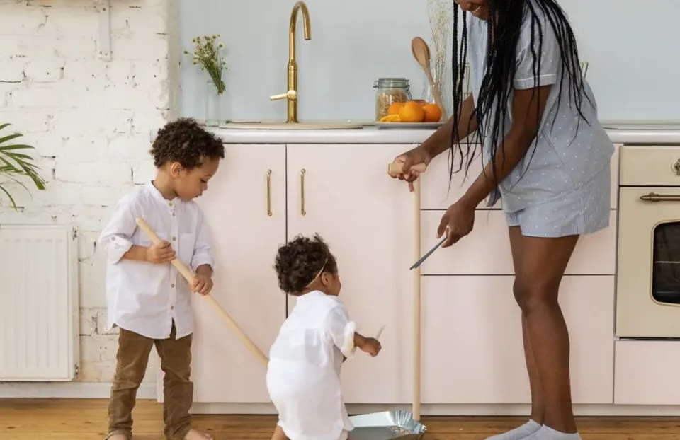 Parent and child discussing chore completion at home
